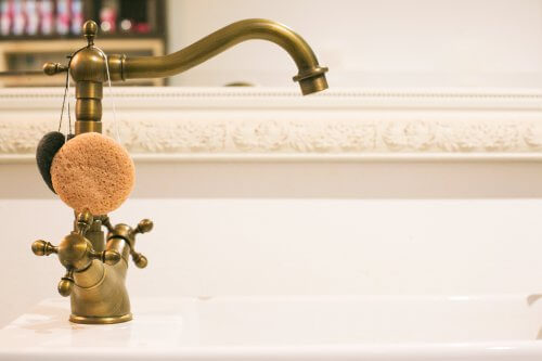 brass tap in a bathroom