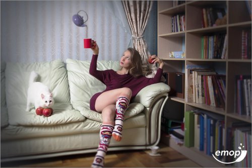 woman with tea and cat