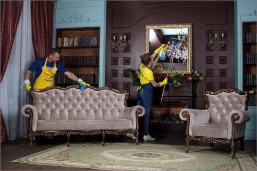 two professional cleaners cleaning