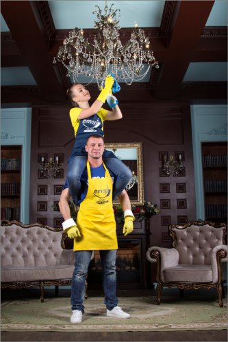 Professional cleaners cleaning Chandelier